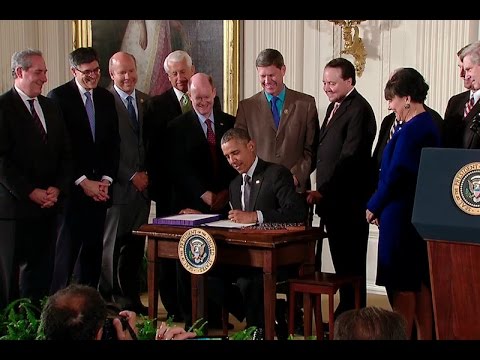 The President Signs Bills that Modernize U.S. Trade Policy