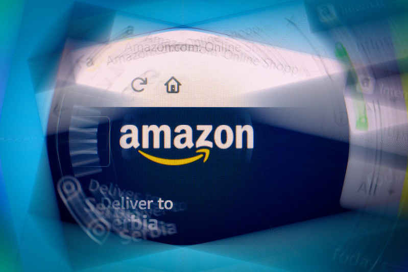 Amazon logo on company website displayed on computer screen with ripple effect by Ivan Radic on flickr