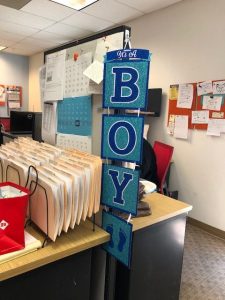 It's a boy! Tim Hu's desk.